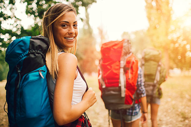 Young Women Hiking In Nature.