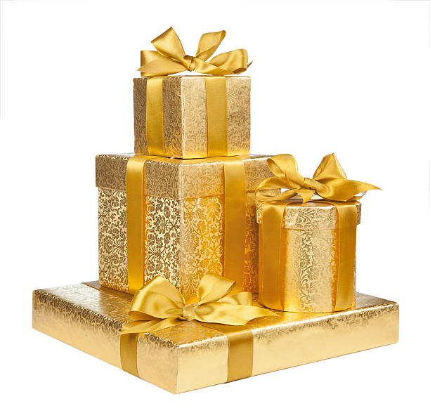 istock Boxes of gold wrapping paper isolated on white background 483702680
