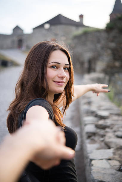 istock beautiful girl is holding by hand 483703070
