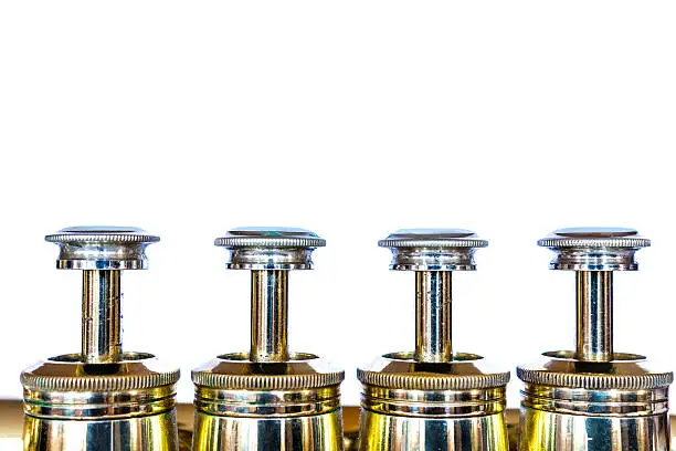 Piccolo Trumpet Pistons isolated on white