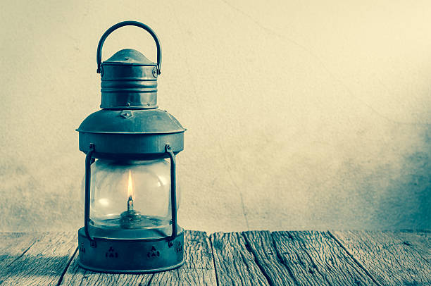 istock old lantern on wood in cross process color tone 483705522
