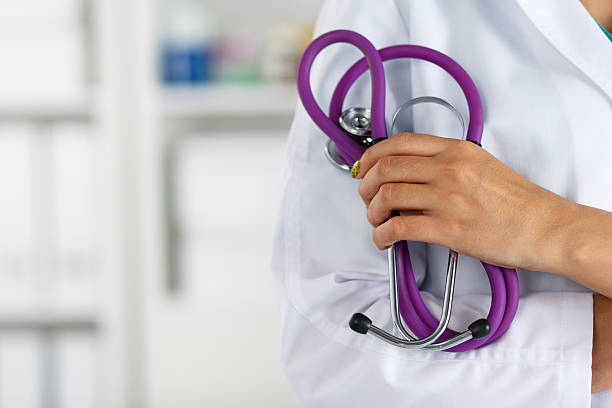 istock Female medicine doctor standing with hands crossed on her chest 483705708