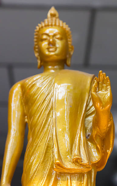 yellow image of buddha stock photo