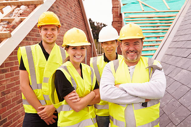 istock Portrait Of Builder On Building Site With Apprentices 483717674