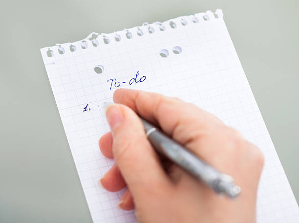 istock Hand With Pen Filling Out To Do List 483718020