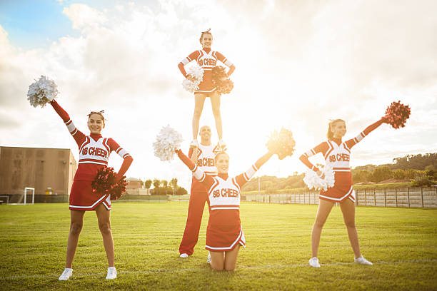 istock Happiness cheerleaders posing with pon-pon 483718031