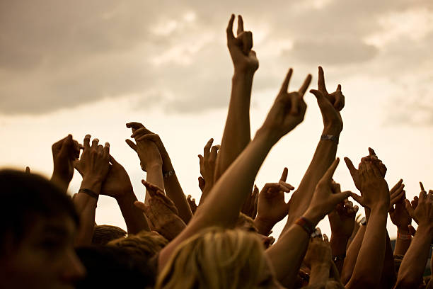 istock hands in a rock concert 483718379