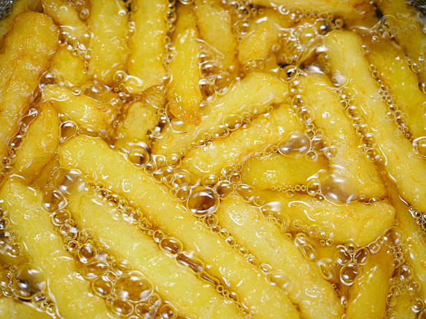 istock French fries in oil 483718724