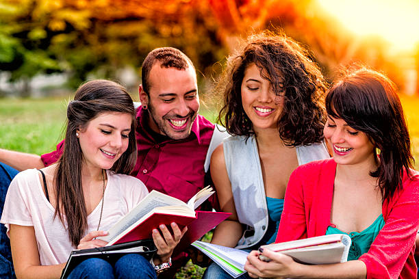 istock Multi-ethnic group of young students sharing at university campus 483719873