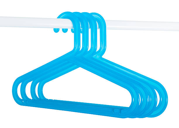 istock Blue hangers on a rod isolated on white 483721487
