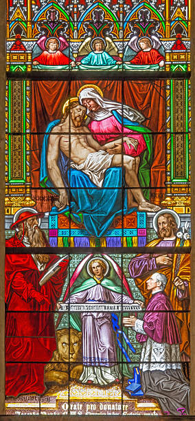istock Bratislava - Pieta on windowpane in st. Martin cathedral. 483723133