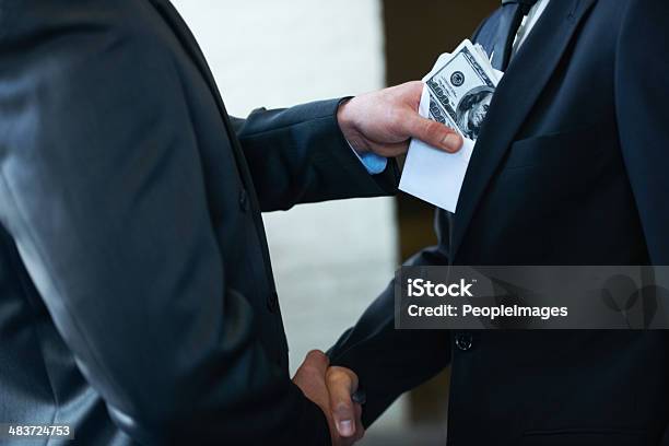 Hes A Rotten Egg In The Corporate World Stock Photo - Download Image Now - Bribing, Currency, Business