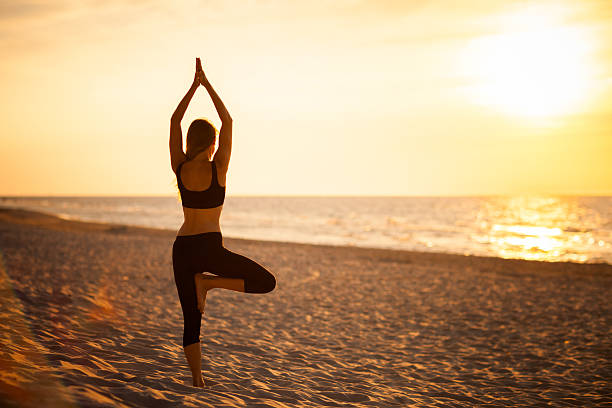 istock Beach yoga session by polish sea 483725514