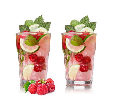 Raspberry mojito. Refreshing alcoholic cocktail with raspberries,lime,rum and mint