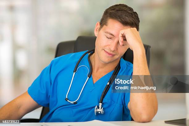 Tired Medical Worker Stock Photo - Download Image Now - 2015, Adult, Adults Only