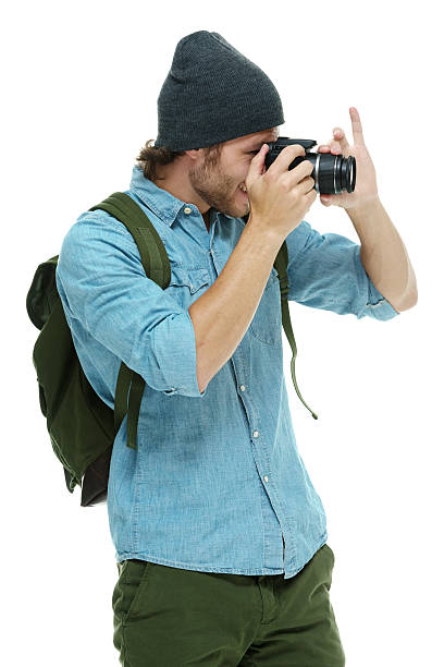 istock Photographer in action with camera 483731606