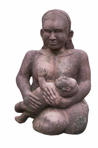 Picture of Breastfeeding moms made of stone Isolated on the white background. Part of the shrine.