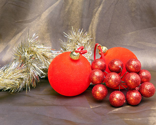 istock Red New Year's ball, decorative berries and tinsel 483736006