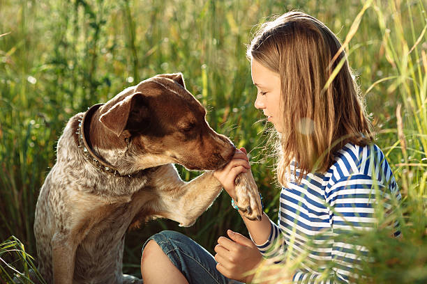 istock beautiful girl with dog 483739424