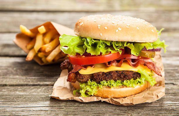 istock Delicious hamburger and fries 483743724