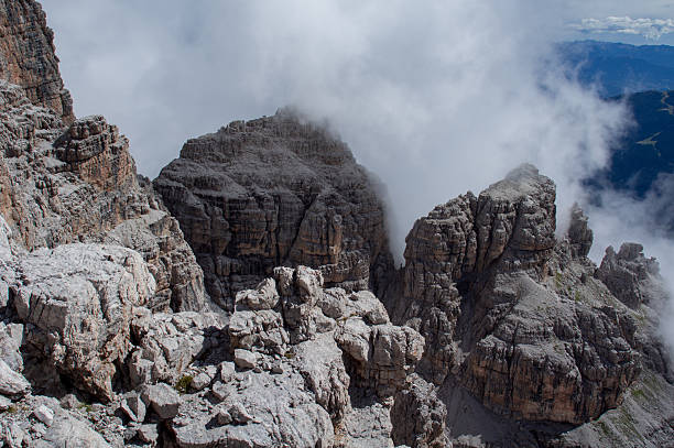 istock Picturesque clouds on the rocks 483743916
