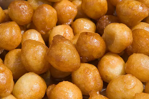 Loukamades, traditional greek/cypriot "honey balls". Served hot, they are usually available from stalls on special occasions.