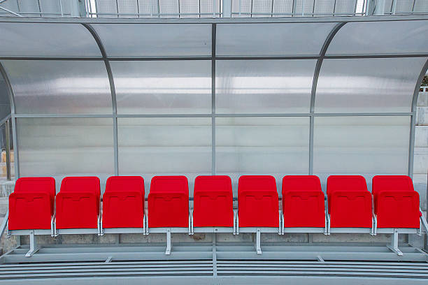 istock Red reserve and staff coach bench in sport stadium 483747259