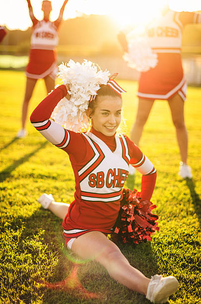 istock Happiness cheerleaders posing with pon-pon 483747359