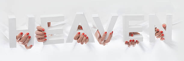 istock Heaven in white cardboard letters 483748026