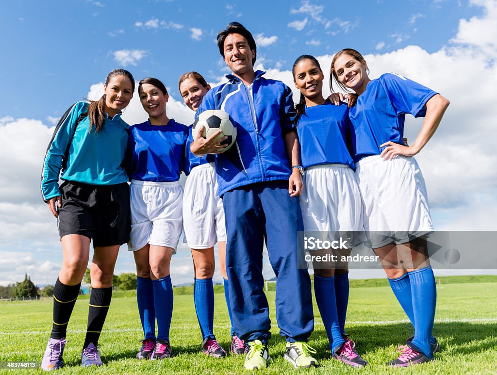 Football team with the coach Football team with the coach at the soccer field 20-29 Years Stock Photo