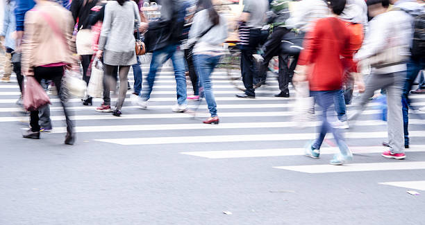 istock People walking on big city street 483748171