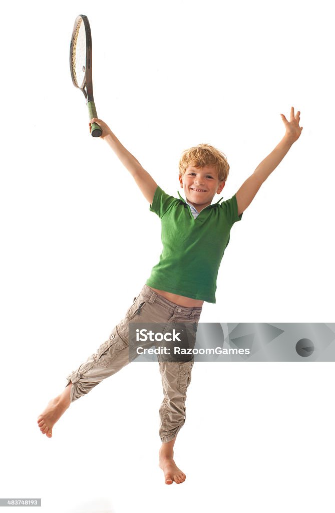 Ragazzo gioca a tennis - Foto stock royalty-free di Giocare