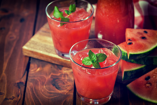 Fresh watermelon smoothie with ice and mint