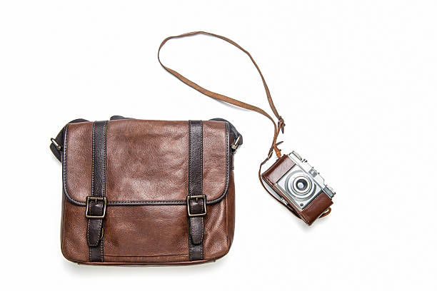 istock Vintage camera and leather bag 483748316
