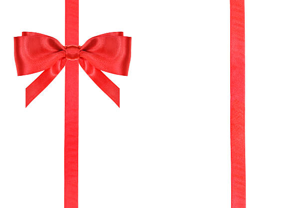 istock red satin bow knot and ribbons on white - 50 483748602