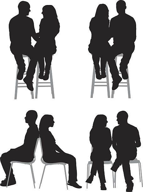 Silhouette of couples Silhouette of coupleshttp://www.twodozendesign.info/i/1.png woman sitting cross legged in chair stock illustrations