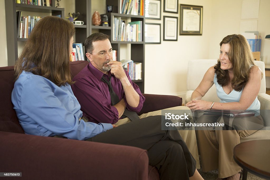 Couple in Marriage Counseling Session MEDICAL STYLE - Couple in Marriage Counseling Session. 30-39 Years Stock Photo