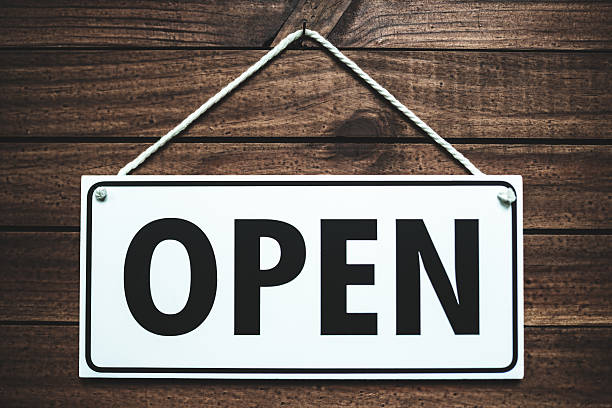 istock open sign on wood wall 483750755
