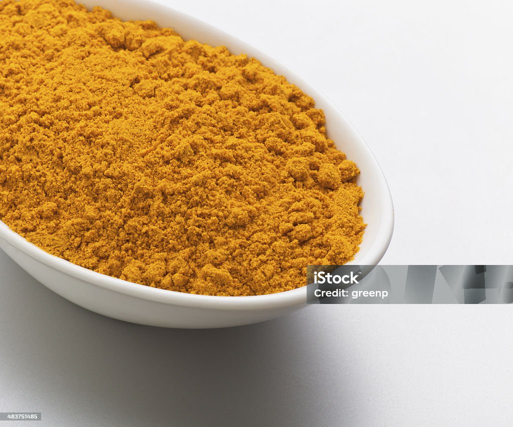 Bowl of turmeric Abundance Stock Photo