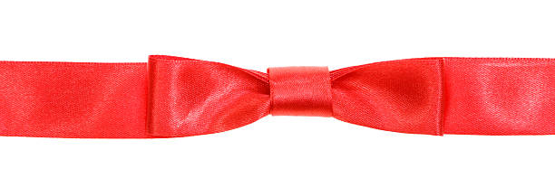 istock real red bow knot on wide silk tape isolated 483751818