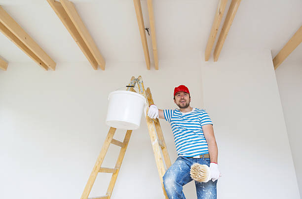 istock Man painting the walls 483752179