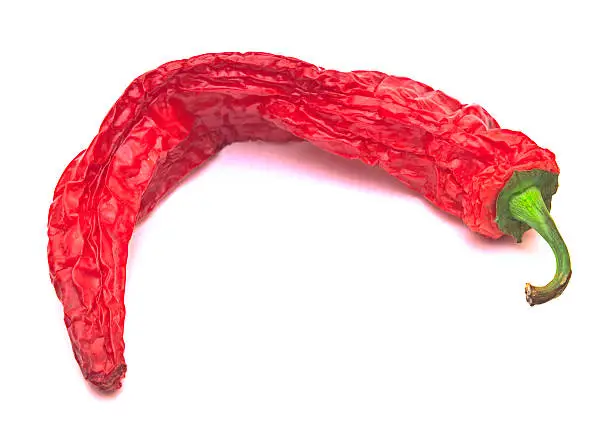 red dry chilli-pepper on white