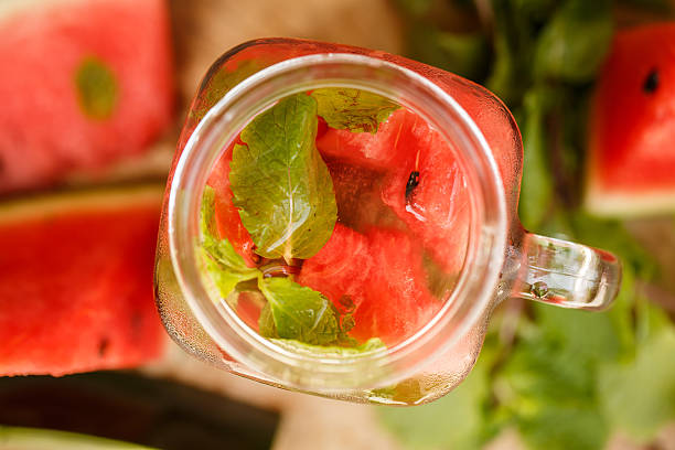 istock Water melon smoothie on garden table 483755380