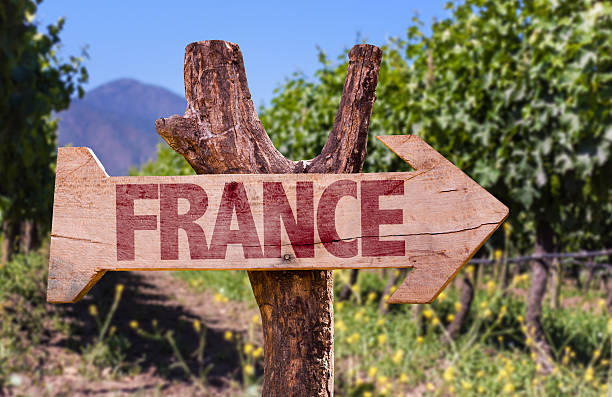 istock France wooden sign with winery background 483758576