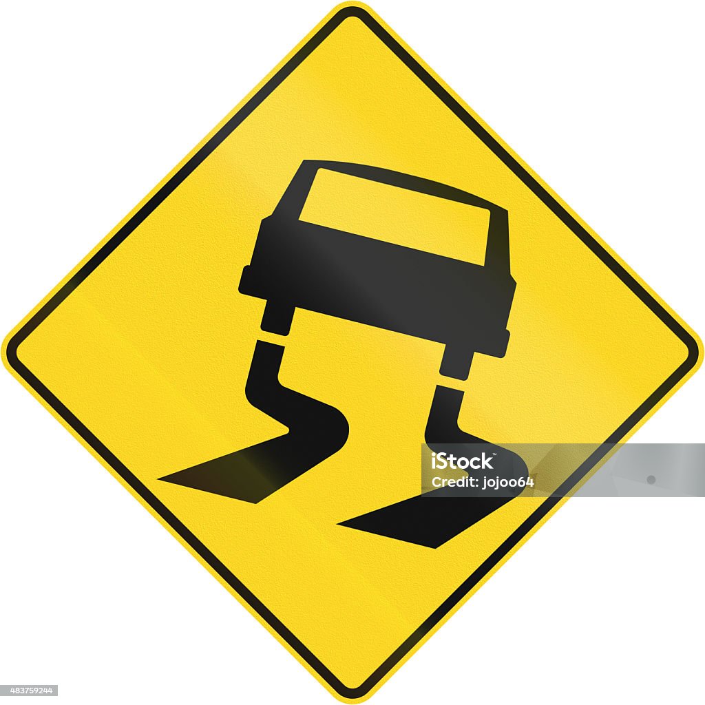 Slippery When Wet In Canada Canadian road warning sign: Slippery when wet. This sign is used in Quebec. 2015 Stock Photo