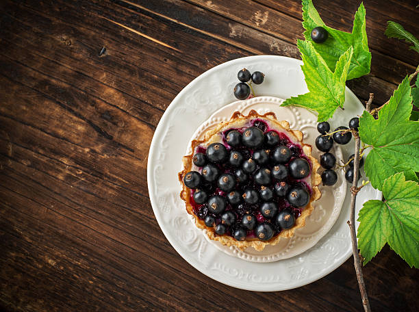 istock Delicious crispy tarts with black currants 483760392