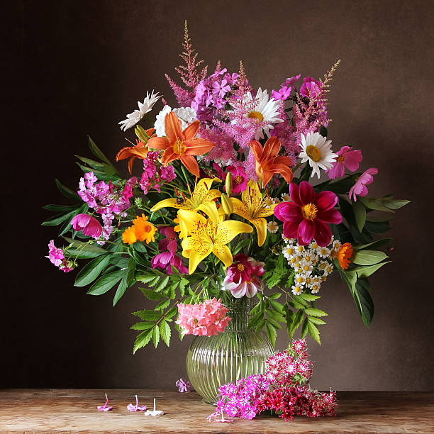 istock Bouquet from cultivated flowers in a jug. 483763636