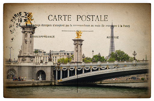 French postcard from Paris with landmark bridge Pont Alexandre III. Vintage sentimental retro style paper background