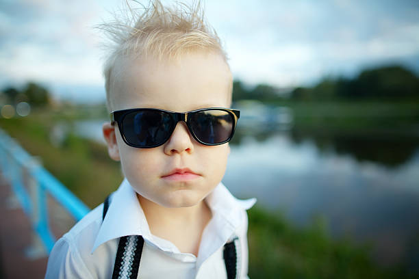 istock little gentleman with sunglasses outdoors 483763716