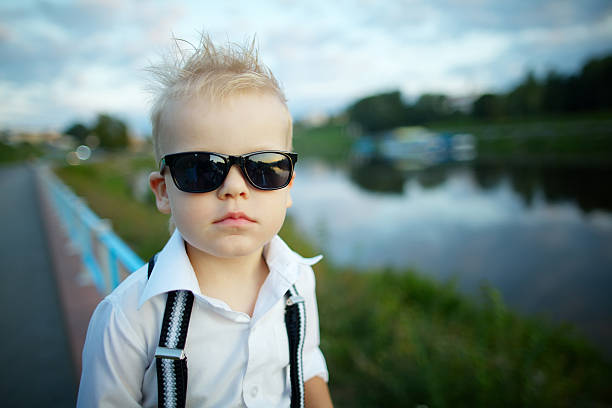 istock little gentleman with sunglasses outdoors 483763732